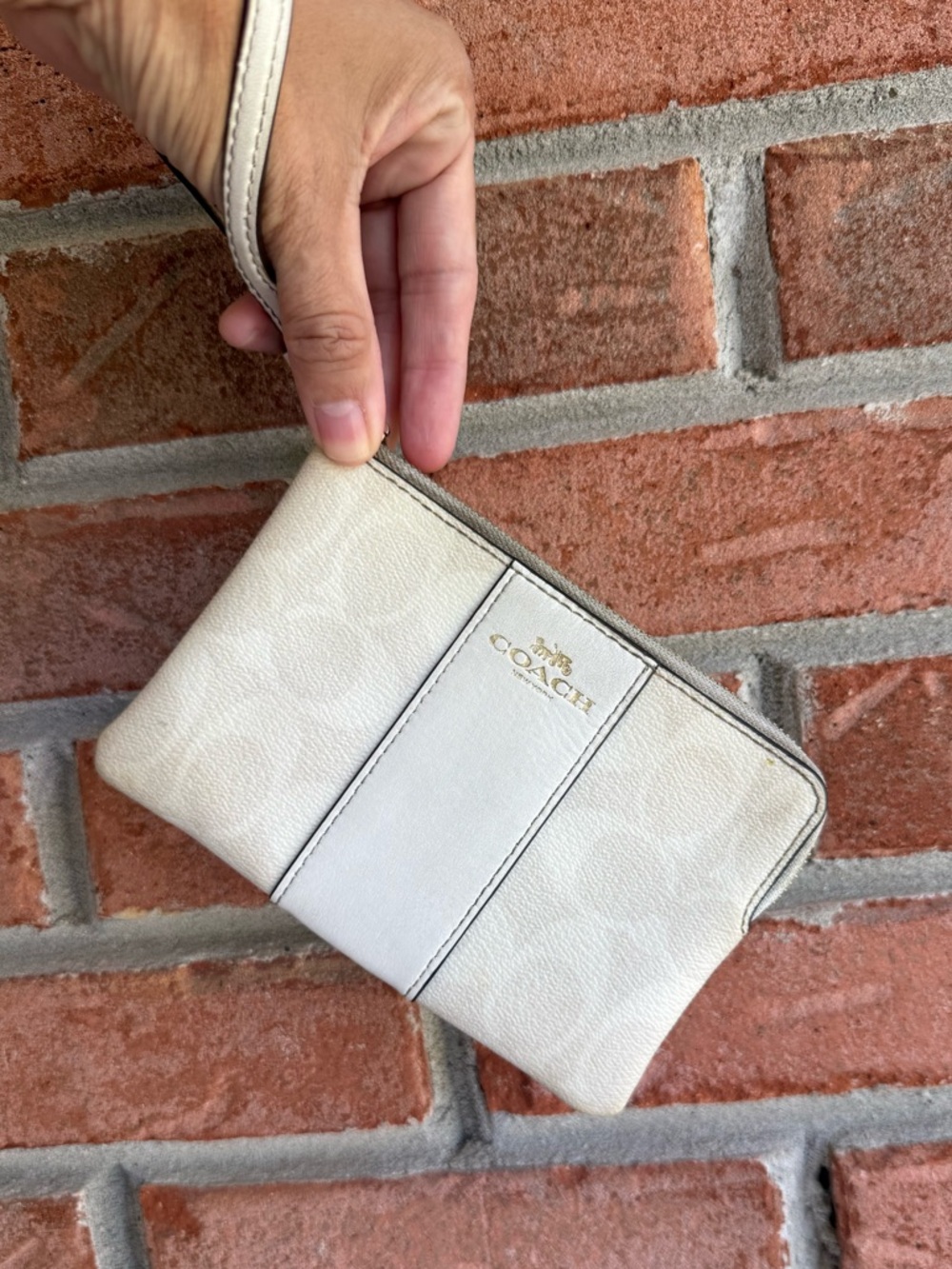 Coach Corner Zip Wristlet clutch wallet  in Signature Canvas.